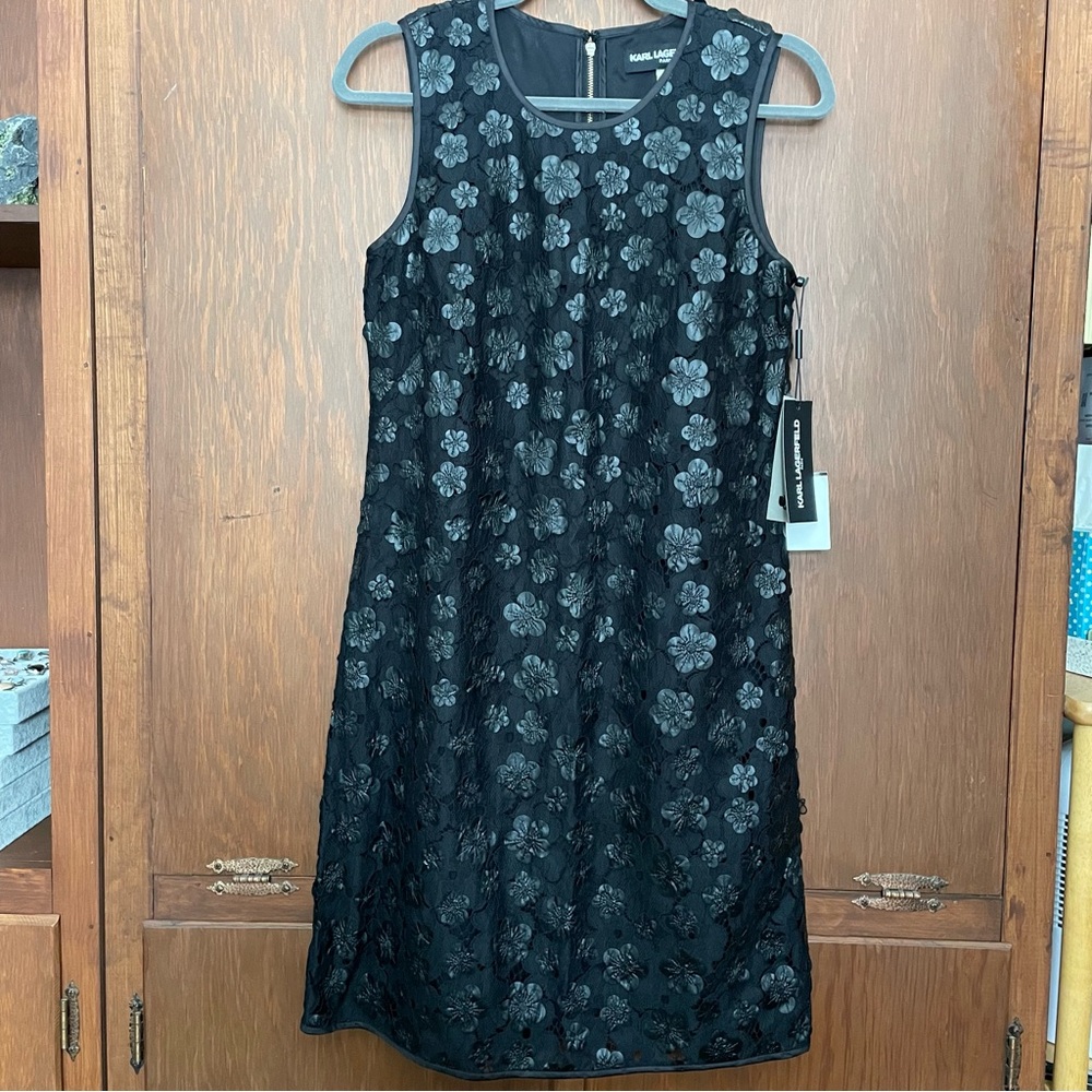 NWT Karl Lagerfeld Paris sleek black cocktail dress with flower accents.